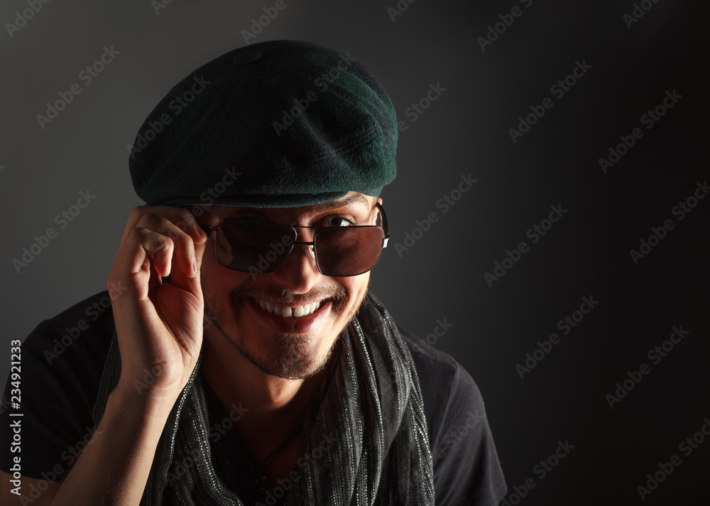 portrait of a handsome guy, wearing sunglasses portrait of a handsome guy, wearing sunglasses