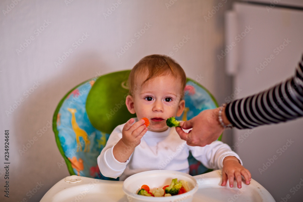 vegetable food for infant. Children eat vegetables. boy eating healthy vegetables. vegetable food for infant. Children eat vegetables. boy eating healthy vegetables.