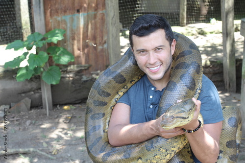 Exotic man with his gigantic Anaconda 