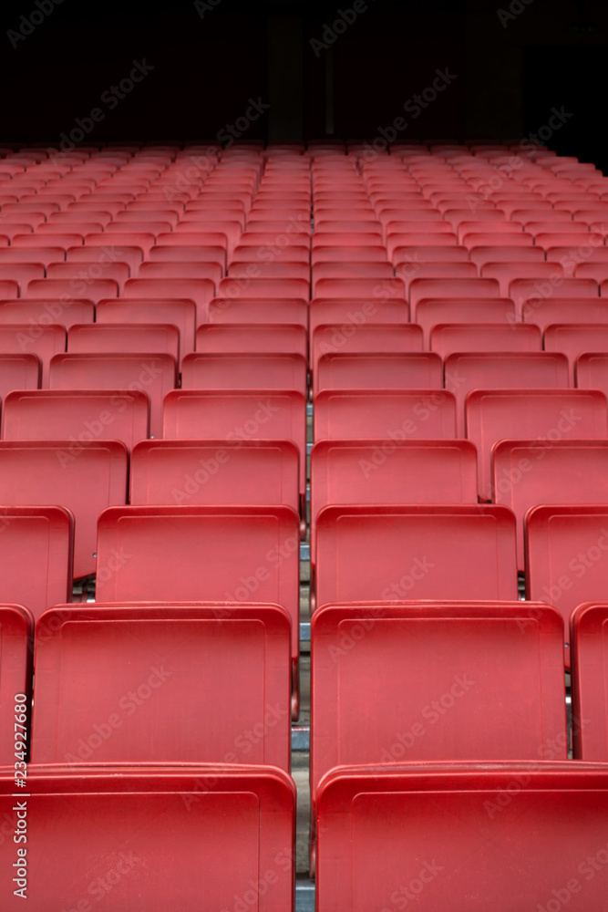 Naklejka premium Red seat row in stadium