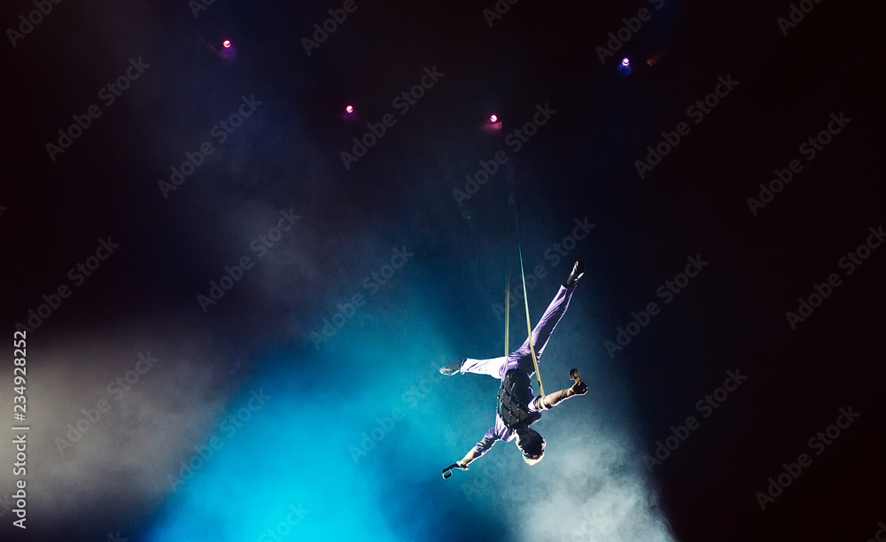Air acrobat in the circus. Air acrobat in the circus.