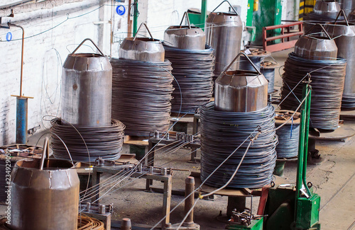 Wire rod, fittings in warehouses. industrial storehouse at the metallurgical plant.