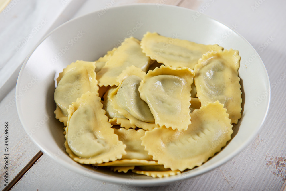 plate of delicious ravioli with spinach