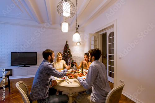 Friends celebrating Christm...