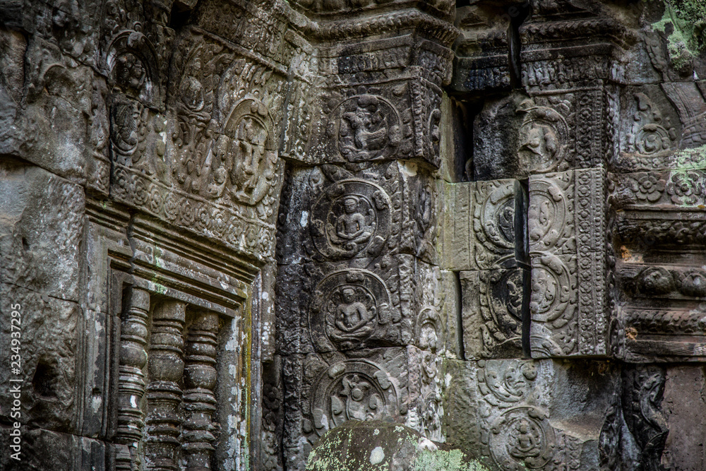 Obraz premium Ta Prohm Angkor Wat Cambodia. The ancient temple of Ta Prohm at Angkor Wat, Cambodia where roots of the jungle trees intertwine with the masonry of these ancient structures producing surreal world.