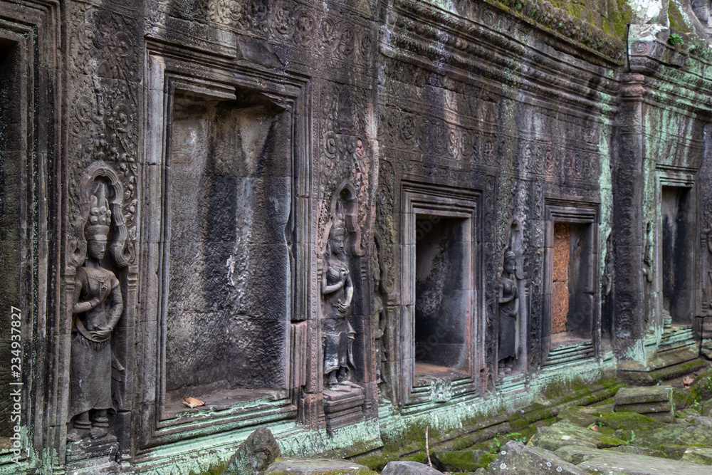Ta Prohm Angkor Wat Cambodia. The ancient temple of Ta Prohm at Angkor Wat, Cambodia where roots of the jungle trees intertwine with the masonry of these ancient structures producing surreal world. Ta Prohm Angkor Wat Cambodia. The ancient temple of Ta Prohm at Angkor Wat, Cambodia where roots of the jungle trees intertwine with the masonry of these ancient structures producing surreal world.