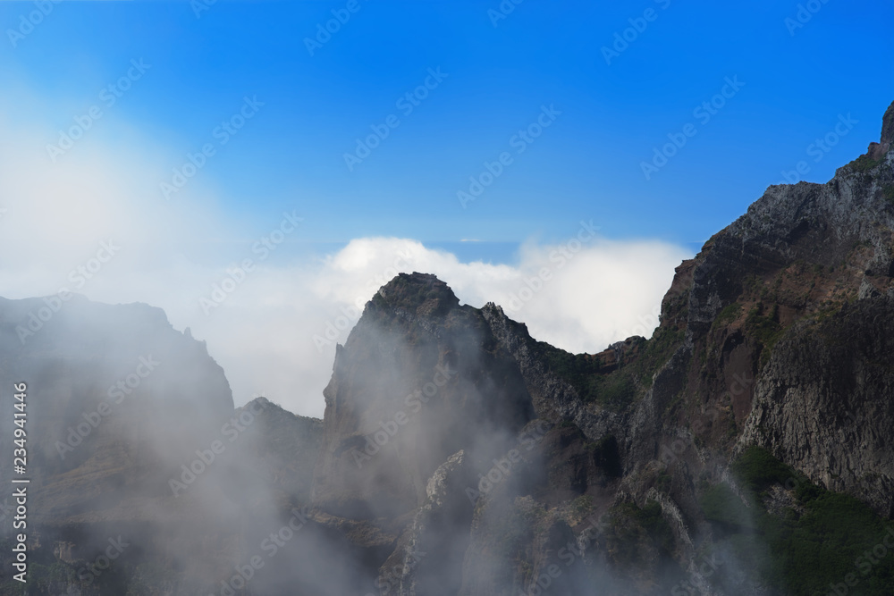 Mountain range in the clouds. Portuguese island of Madeira