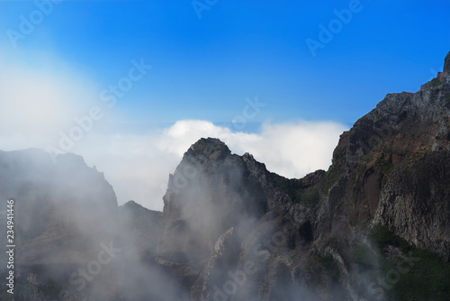 Mountain range in the clouds. Portuguese island of Madeira
