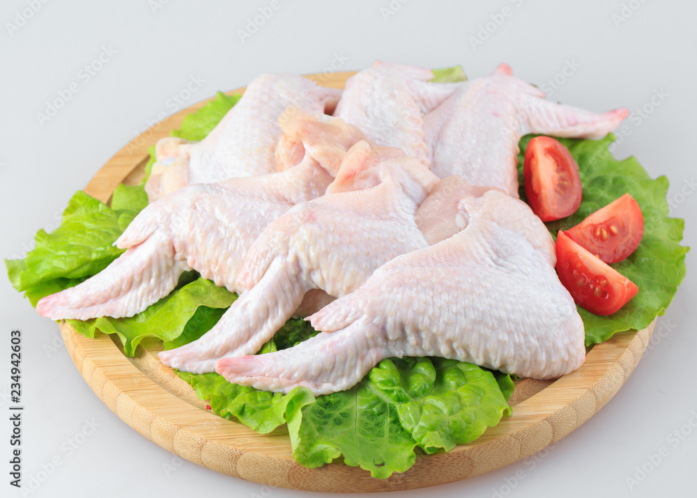 raw chicken wings on white background raw chicken wings on white background