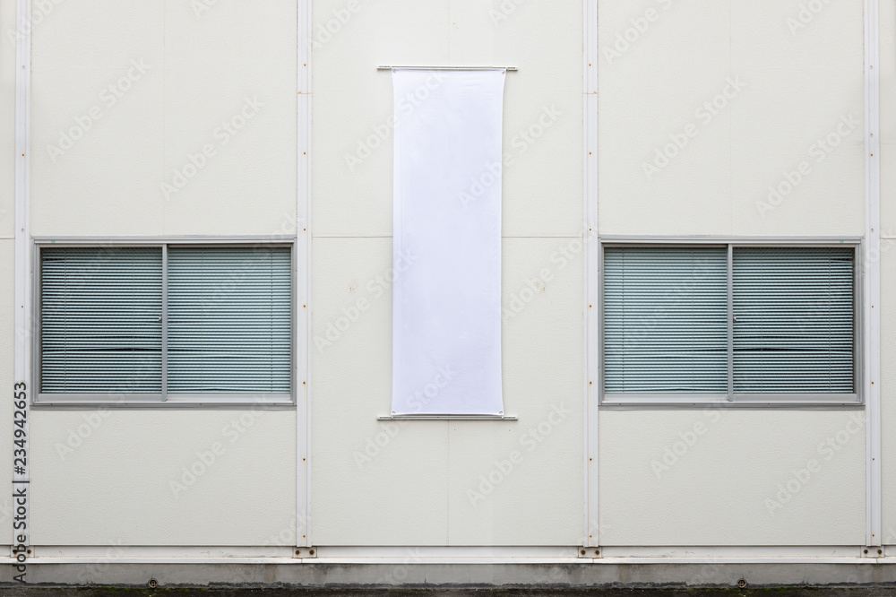 Fototapeta premium Large blank billboard on a street wall, banners with room to add your own text