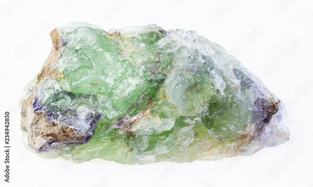 raw green Beryl with Alexandrite stone on white raw green Beryl with Alexandrite stone on white