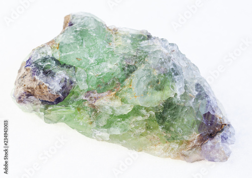 raw green Beryl with Alexandrite crystals on white