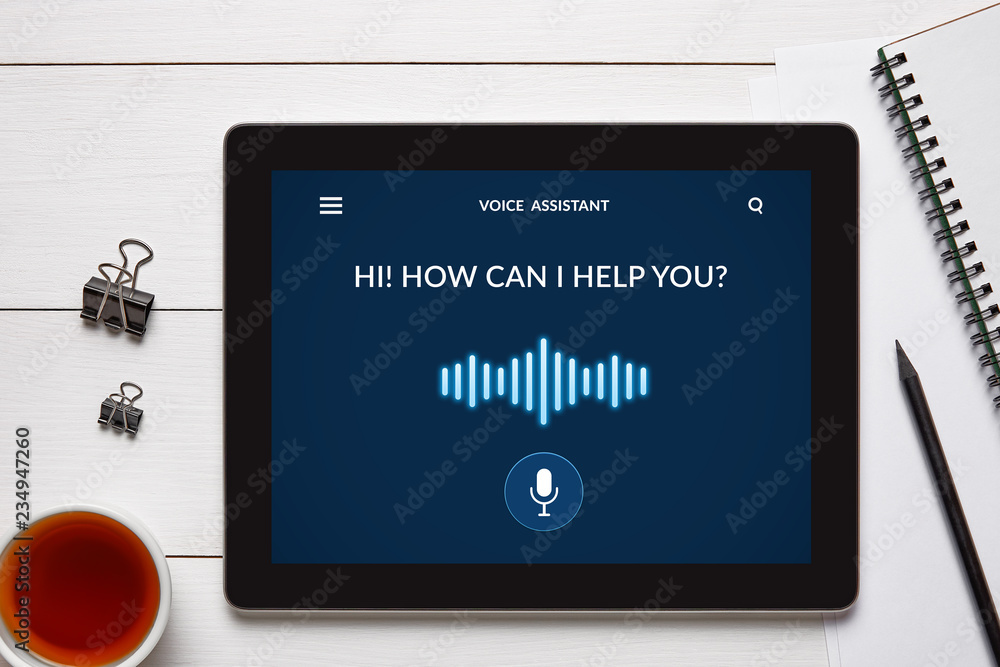 Voice assistant concept on tablet screen with office objects - obrazy, fototapety, plakaty 