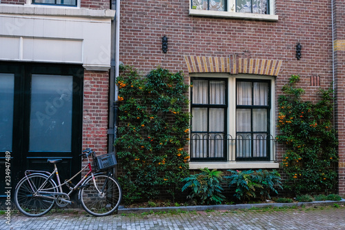bicycle parked at the front door in Amsterdam