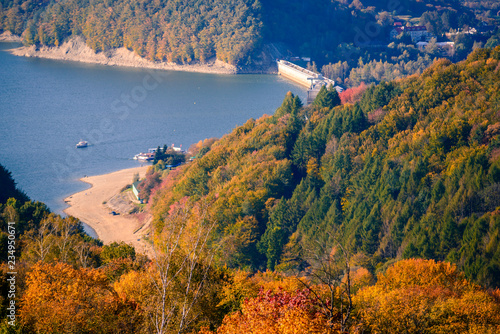 Fototapeta Naklejka Na Ścianę i Meble -  Solina Lake, Bieszczady, Poland. Views from hill to lake in sunny autumn day