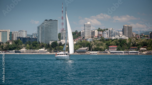 White yacht sailing in the open sea