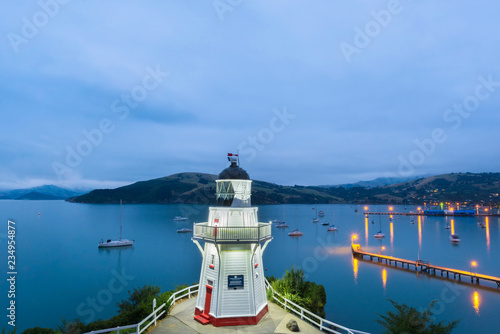 New Zealand, South Island, Canterbury, Banks Peninsula, Akaroa Lighthouse at Dusk photo