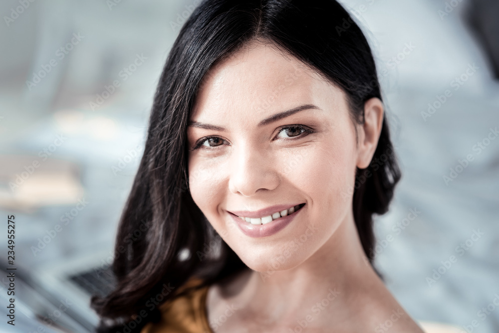 Portrait of pretty woman that posing on camera