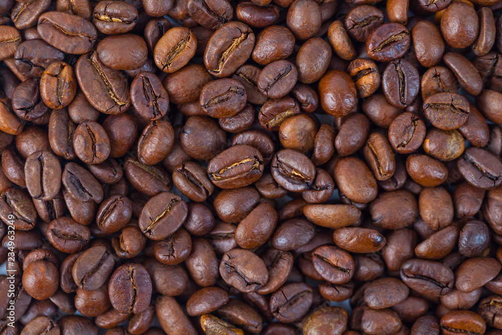 Roasted brown coffee beans pattern, background, top view Roasted brown coffee beans pattern, background, top view
