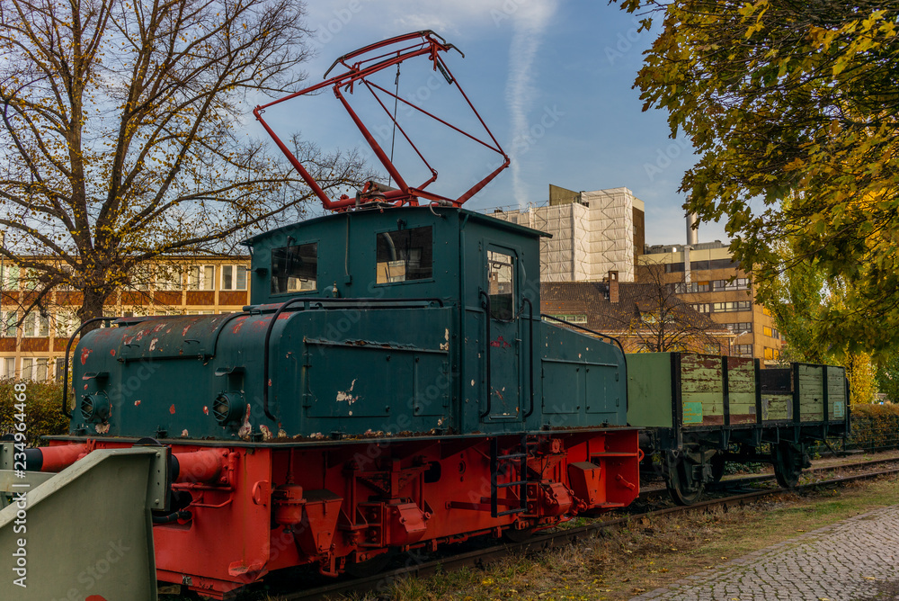 Fototapeta premium A lonely old locomotive in the Berlin inland port and freight station