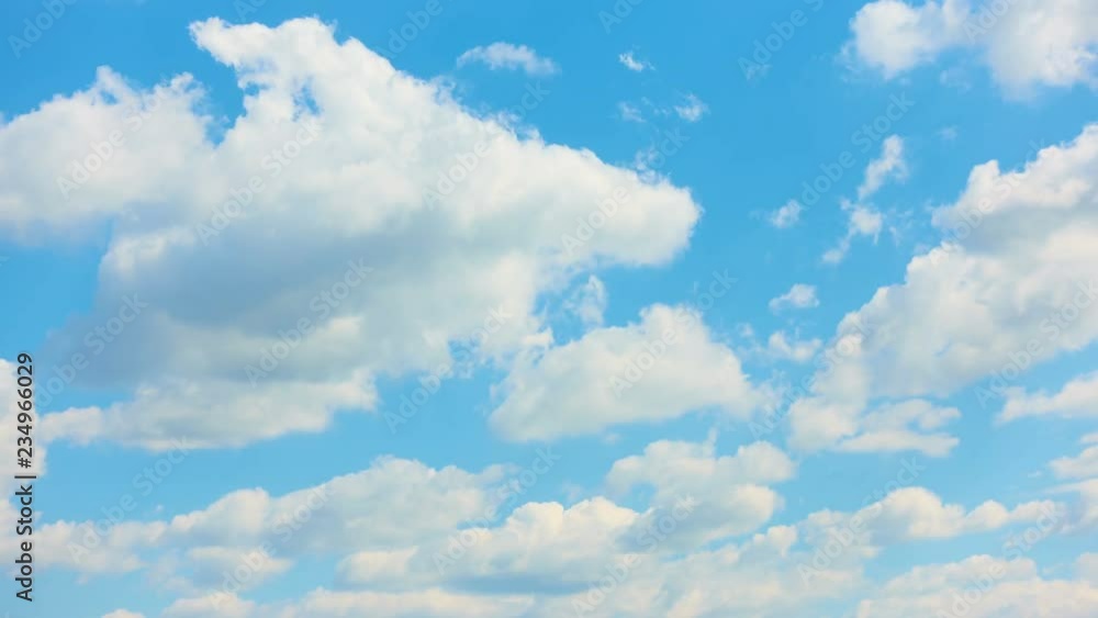 Beautiful white clouds moving across summer blue sky. Timelapse, 4K video for nature-related projects Beautiful white clouds moving across summer blue sky. Timelapse, 4K video for nature-related projects