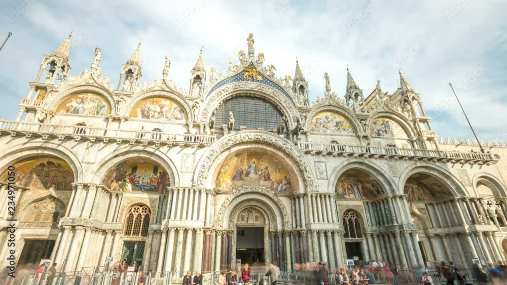 Basilica di San Marco in Venice, Italy. Hyperlapse timelapse video with clouds. Piazza San Marco (st. Mark's) square, Venice, Italy. Tourist walkng in front of church. Basilica di San Marco in Venice, Italy. Hyperlapse timelapse video with clouds. Piazza San Marco (st. Mark's) square, Venice, Italy. Tourist walkng in front of church.