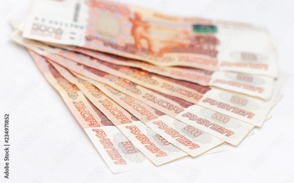 Scattered Russian 5000 rubles banknotes closeup Scattered Russian 5000 rubles banknotes closeup