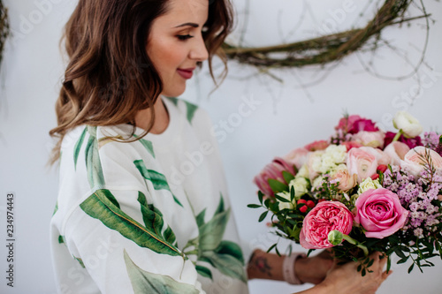 Florist makes a bouquet.