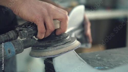 Car Mechanic Sanding Car