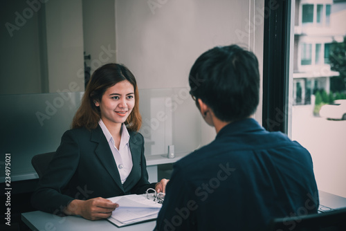 Wallpaper Mural Bussiness woman and man talking about new product,Representatives from the insurance companies selling products to customers,Thailand people Torontodigital.ca