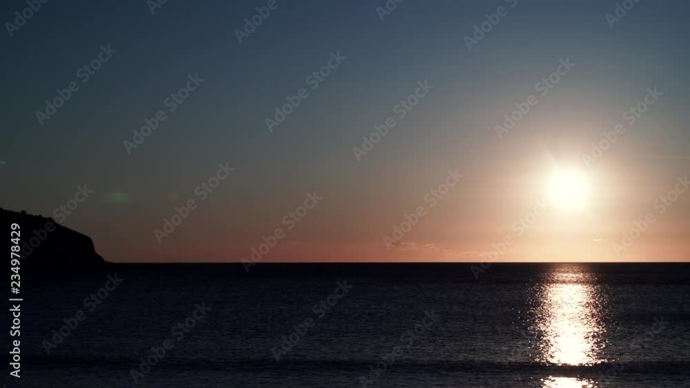 Scenic sunset over sea surface, Greece Peloponnese Scenic sunset over sea surface, Greece Peloponnese