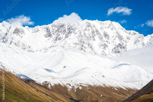 Beautiful view of Shkhara Glacier snowy peak from Ushguli village, the highest mountain in Georgia. Svaneti, Caucasus.