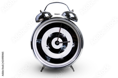 alarm clock in the form of a target as a symbol of time killed photo