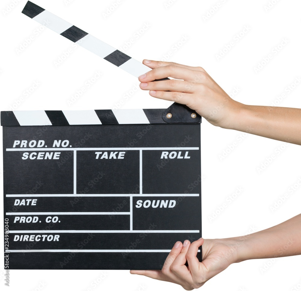 Fototapeta premium Human Hands Holding a Movie Clapboard - Isolated