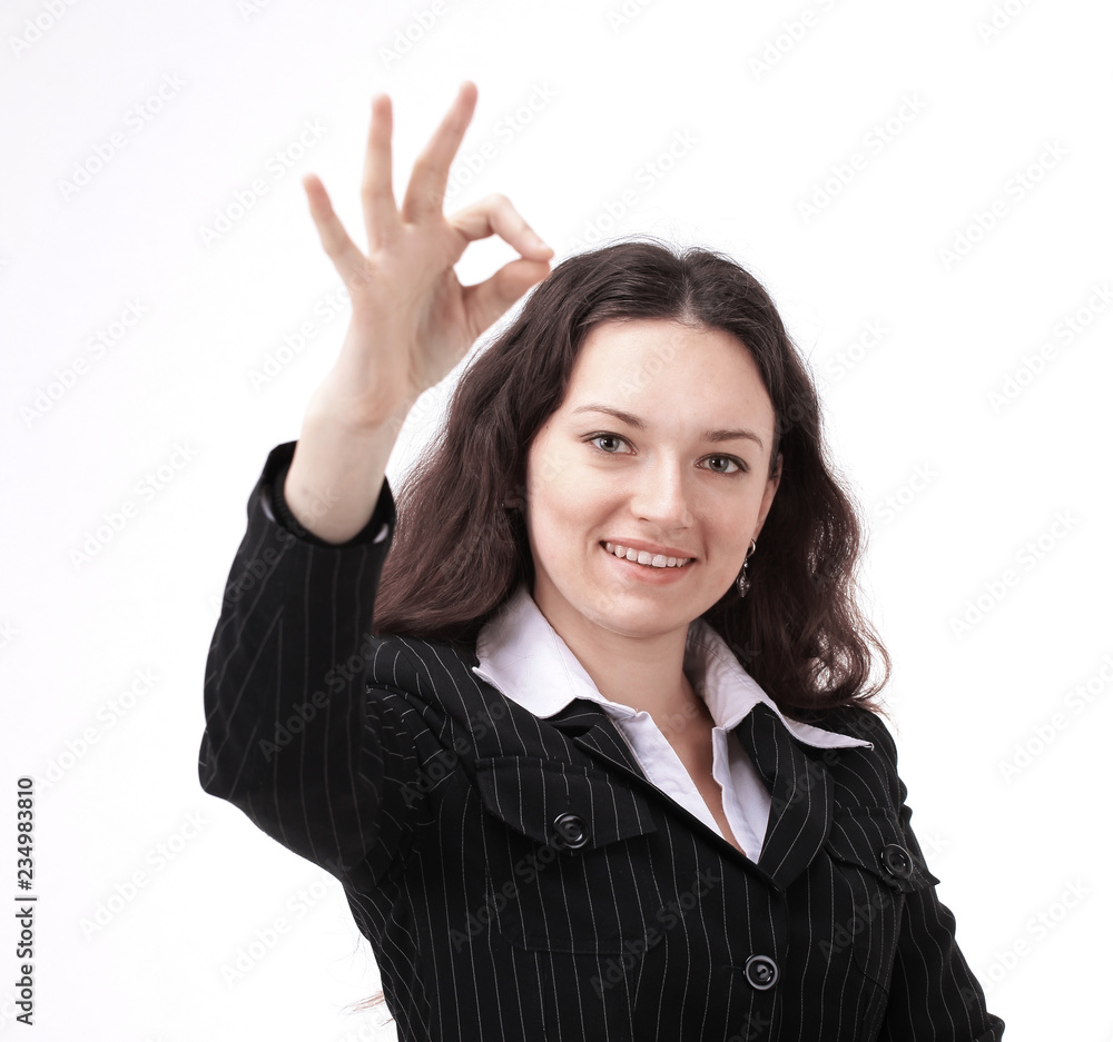 modern young business woman showing OK sign. modern young business woman showing OK sign.