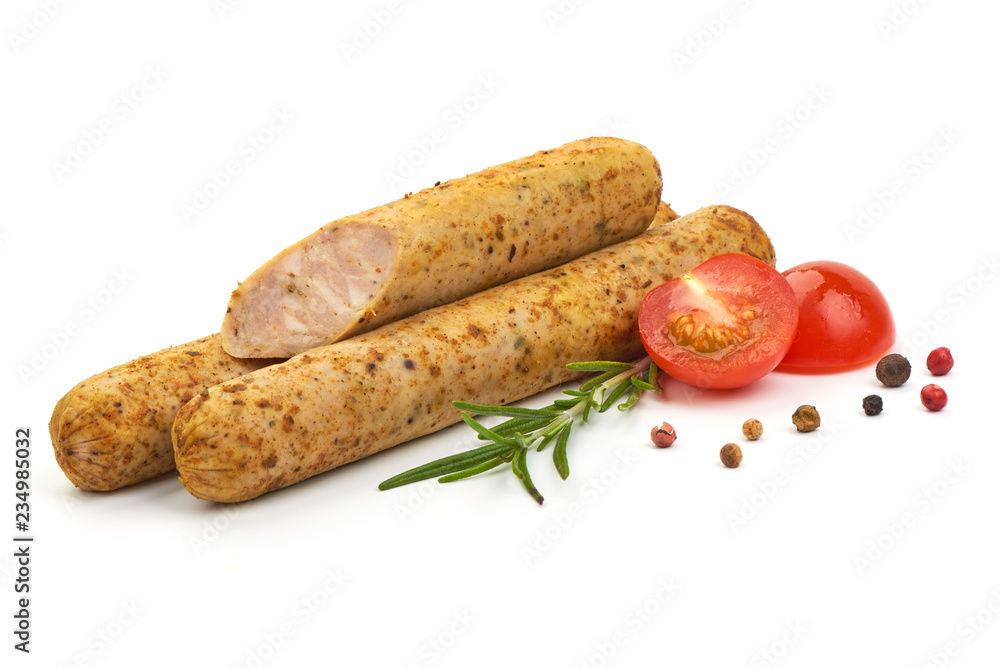 Roasted Spicy Tasty Sausages with herbs, pepper and tomatoes, isolated on a white background. Close-up. Roasted Spicy Tasty Sausages with herbs, pepper and tomatoes, isolated on a white background. Close-up.