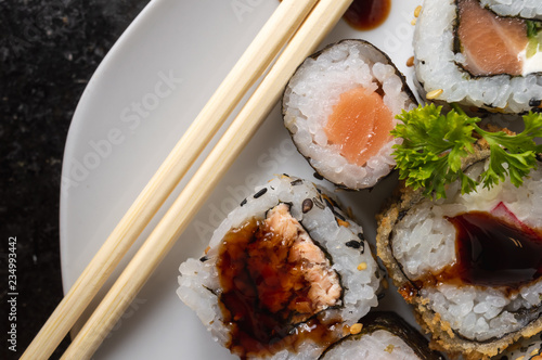 Japanese food on a white plate seen from top photo