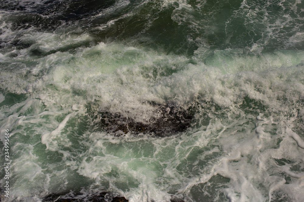 Obraz premium Waves during a storm. View from above. Red code. Rest on the Black Sea coast in Bulgaria. Elemental force.