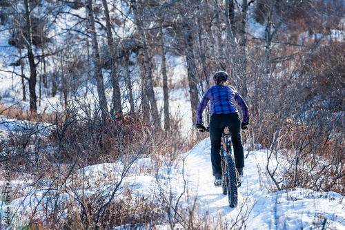 Woman Riding a Fat Bike in the Snow