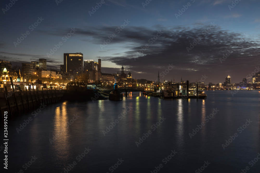Riversind in downtown of Hamburg at dusk.