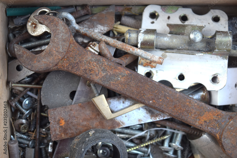 Rusty wrench is in a box with tools Rusty wrench is in a box with tools