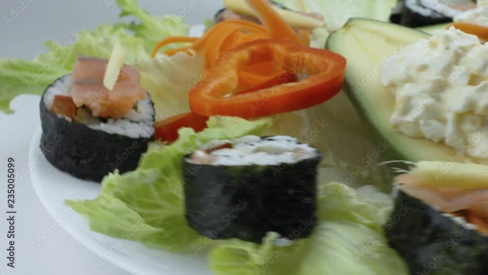 Stuffed Avocadoes, Suchi and Salad Toast Spinning Side View Stuffed Avocadoes, Suchi and Salad Toast Spinning Side View