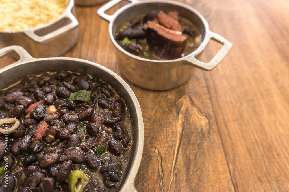 Dishes that are part of the traditional feijoada, typical Brazilian food Dishes that are part of the traditional feijoada, typical Brazilian food