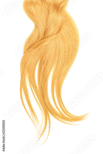 Curl of natural blond hair, isolated on white background