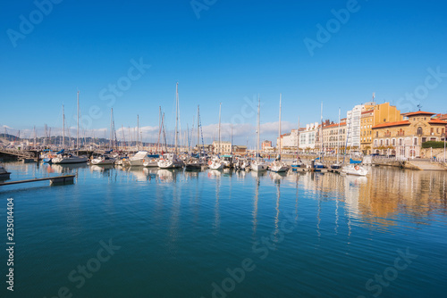 Gijon cityscape. Yatchs in marina port of Gijon, Asturias, Spain. © herraez