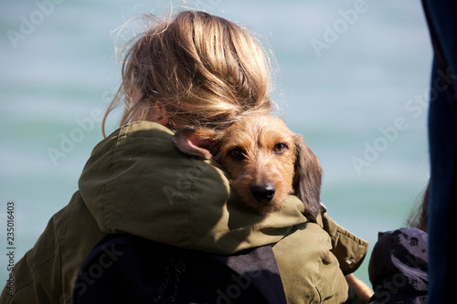 Dog on woman's shoulder on ferry boat in Venice on April 5, 2018 (5211)