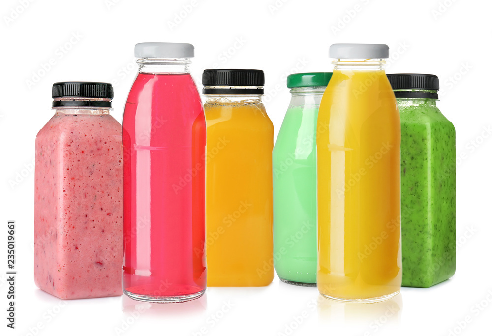 Set with bottles of different juices on white background Set with bottles of different juices on white background
