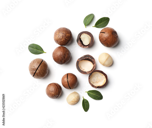 Composition with organic Macadamia nuts on white background, top view photo