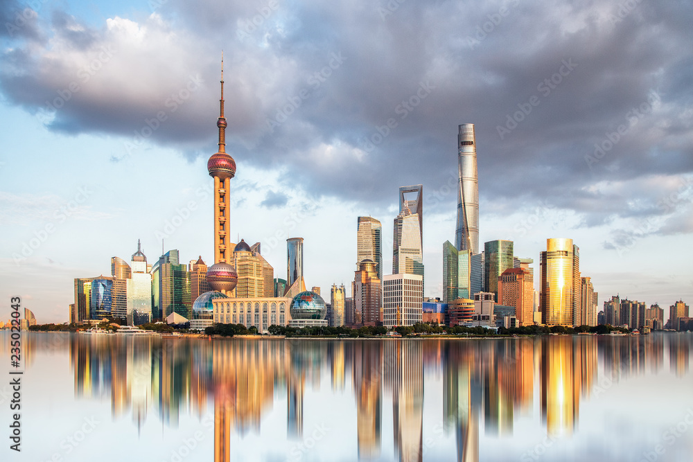 ShangHai,China.Cloudy sunsets, panoramic views of city buildings, reflections on water