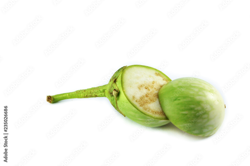 Organic green thai eggplant on a white background. Organic green thai eggplant on a white background.